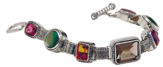Sterling silver link bracelet with gypsy red topaz, twilight topaz, black mother of pearl, and smoky quartz in mixed silver textures