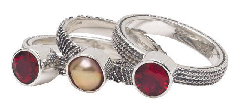 Set of three sterling silver stacking rings with gypsy red topaz and bronze pearl in mixed shank textures