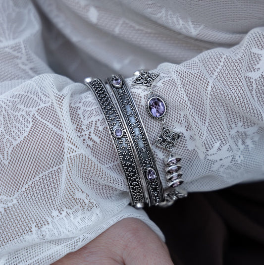 Sterling silver bracelets with amethyst stones and granulation detailing, Heirloom Collection 2002, Lori Bonn Archive.