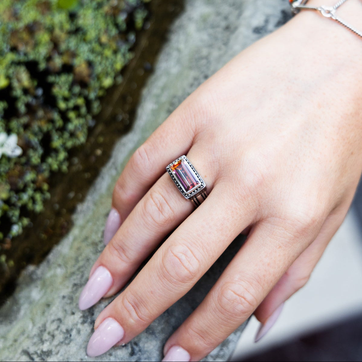 Sterling silver ring with emerald-cut deep twilight topaz and beaded detailing from the Sasha 2003 Archive, size 7.